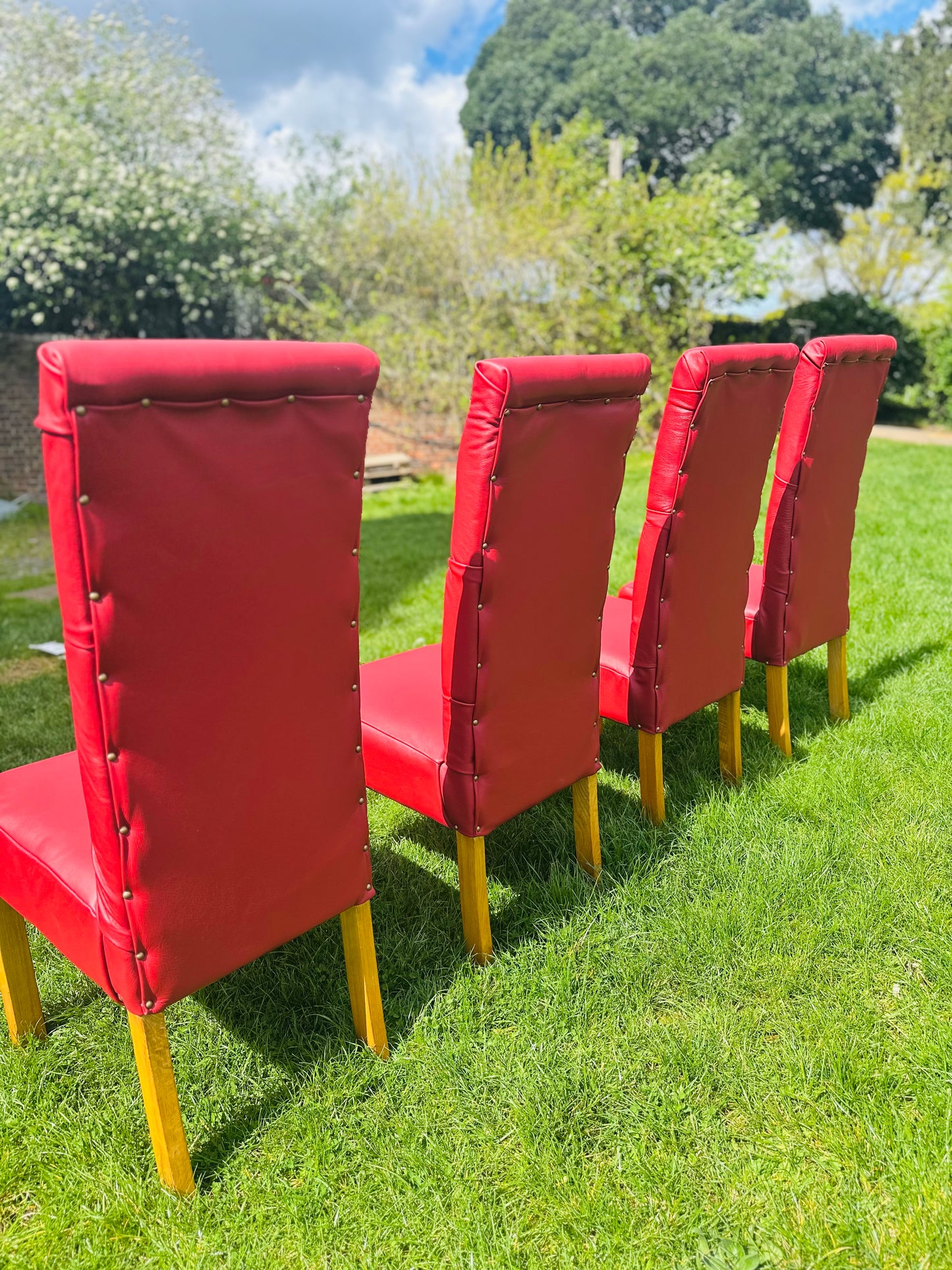 Set of 4 Upholstered Chesterfield-style dining chairs in Deep Red Leather