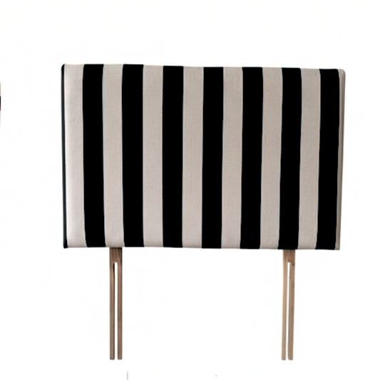Black and white striped headboard on a white background