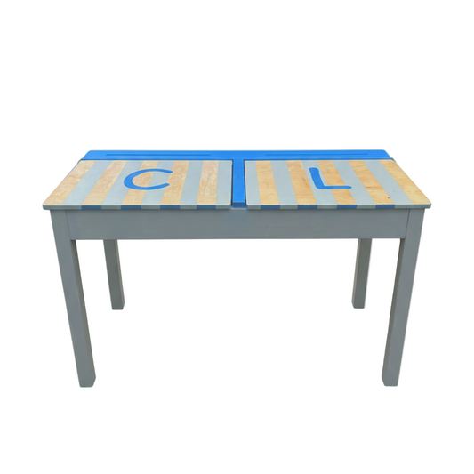 upcycled Wooden children's desk with a blue top and green base on a white background