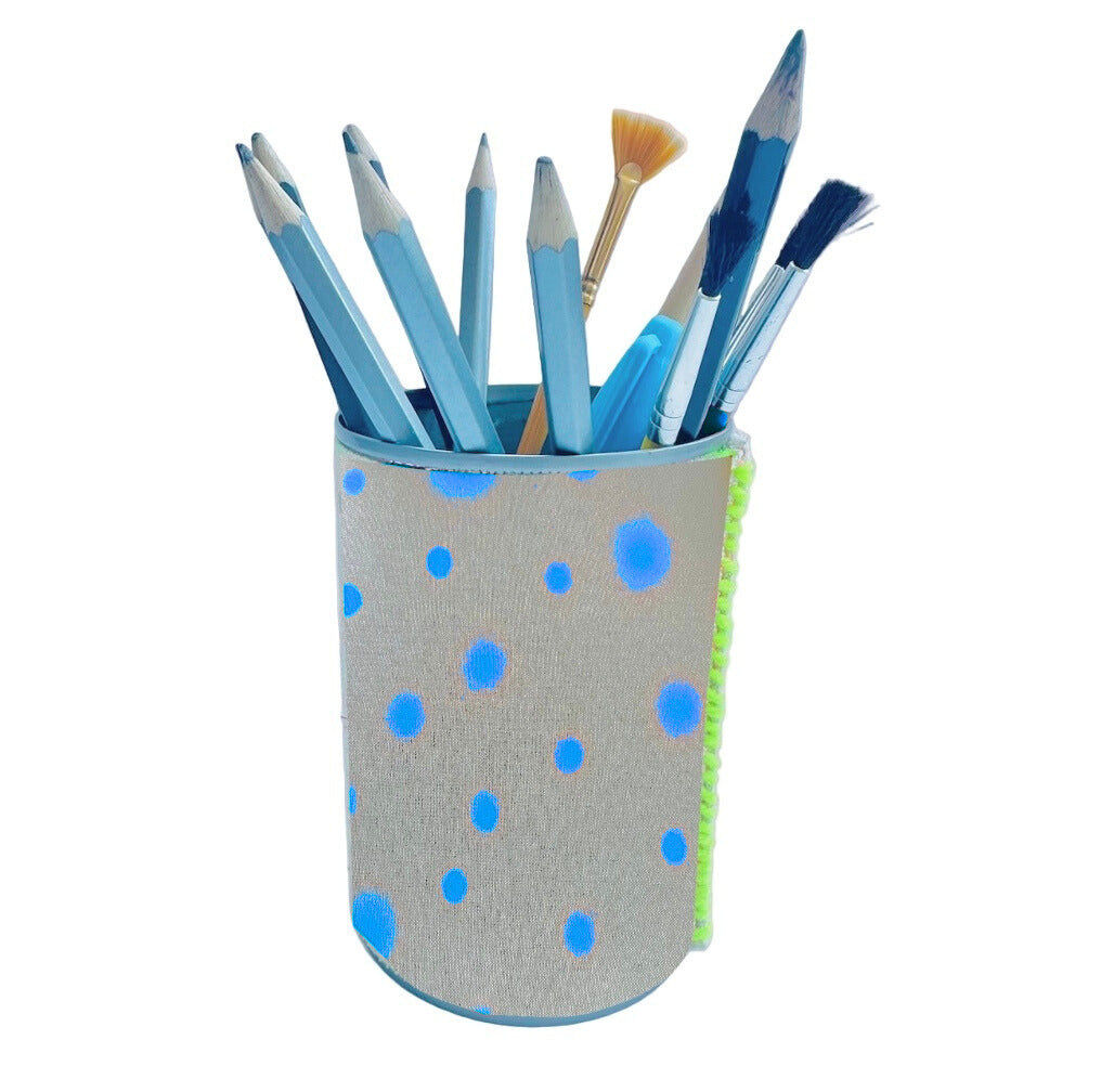 Upcycled tin holder using spray painted polka dot print on linen fabric 