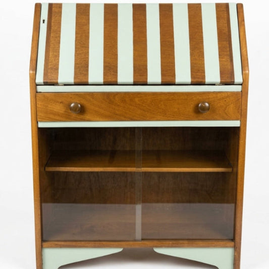 Wooden desk with striped top on a white background